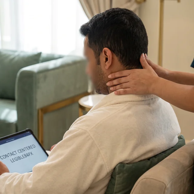 Focused head and neck massage for a seated client