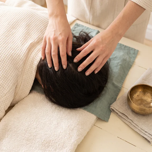 Fingertip scalp massage through dry hair